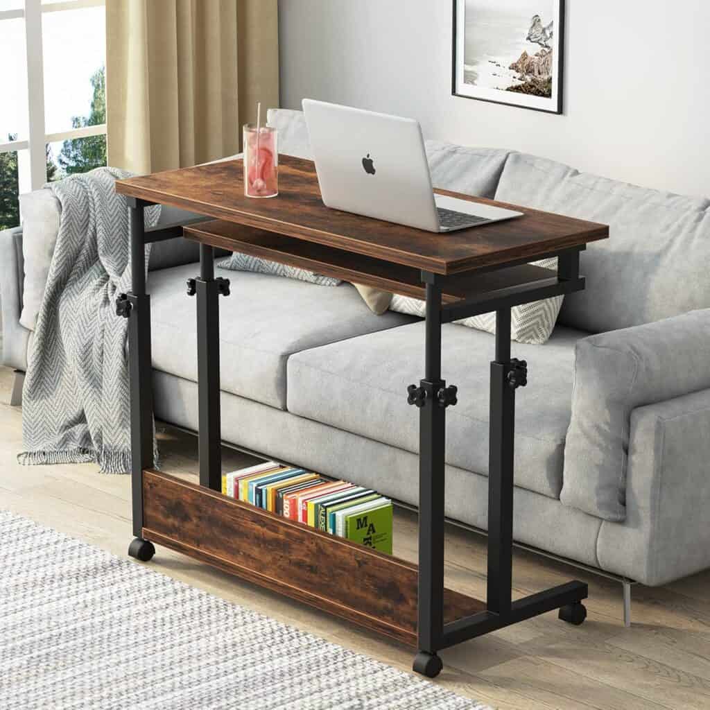 Image of a Tribesigns 32-Inch Height Adjustable Portable Desk next to a couch.